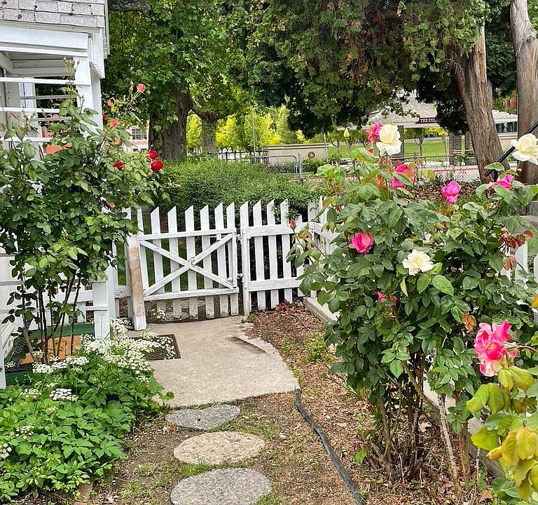 Path from the backyard leading to the side entrance.