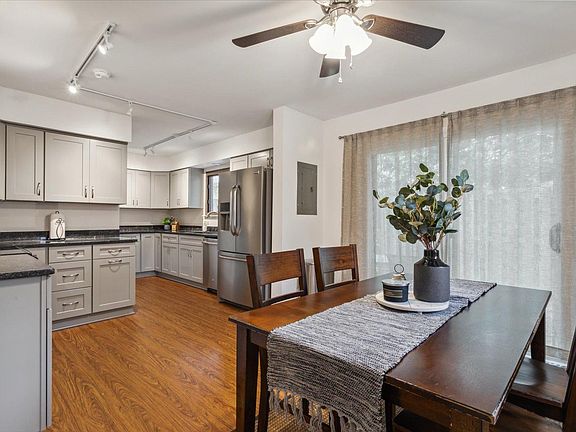 Kitchen and dining room - with sliding door to private patio.