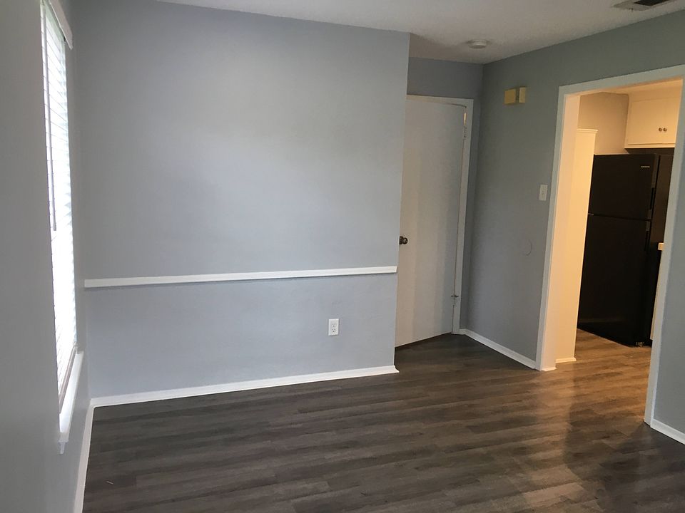 Dining area and entry to kitchen. The door seen in this picture is the entry to bedroom.