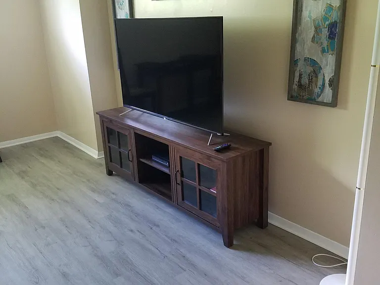 Lower level entertainment stand