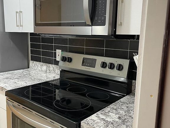 Microwave and Stove - Stainless appliances