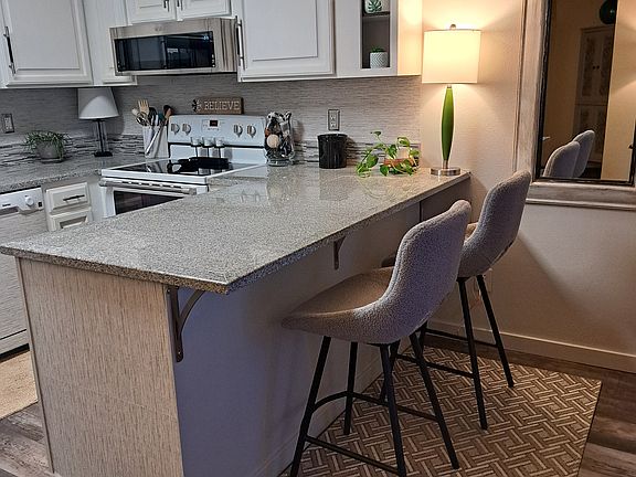 Counter Top with Bar Stools