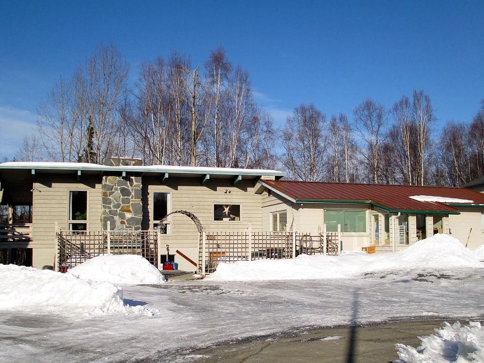 Sunny Snow Circle (studio is on left with tall windows)