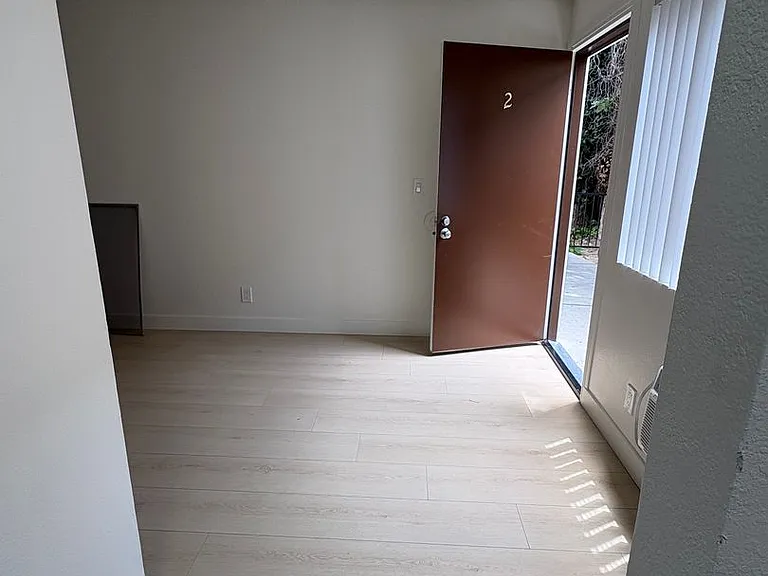 WOD - Woodman Apartments — Photo 6
