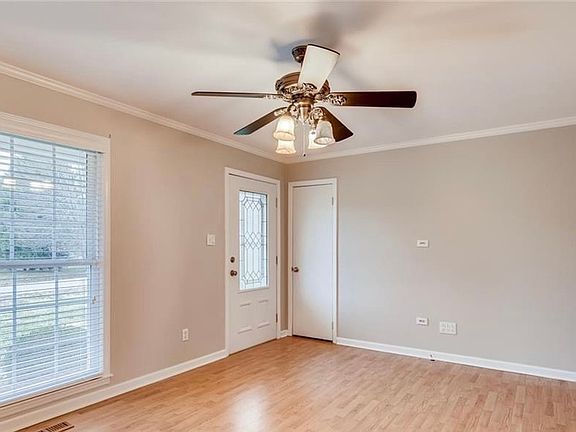 Front door leads into family room located at front of home.