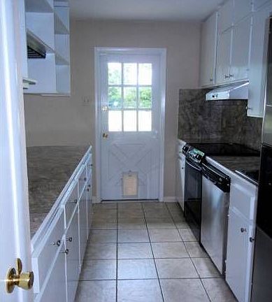 kitchen with fresh paint, some stainless appliances
