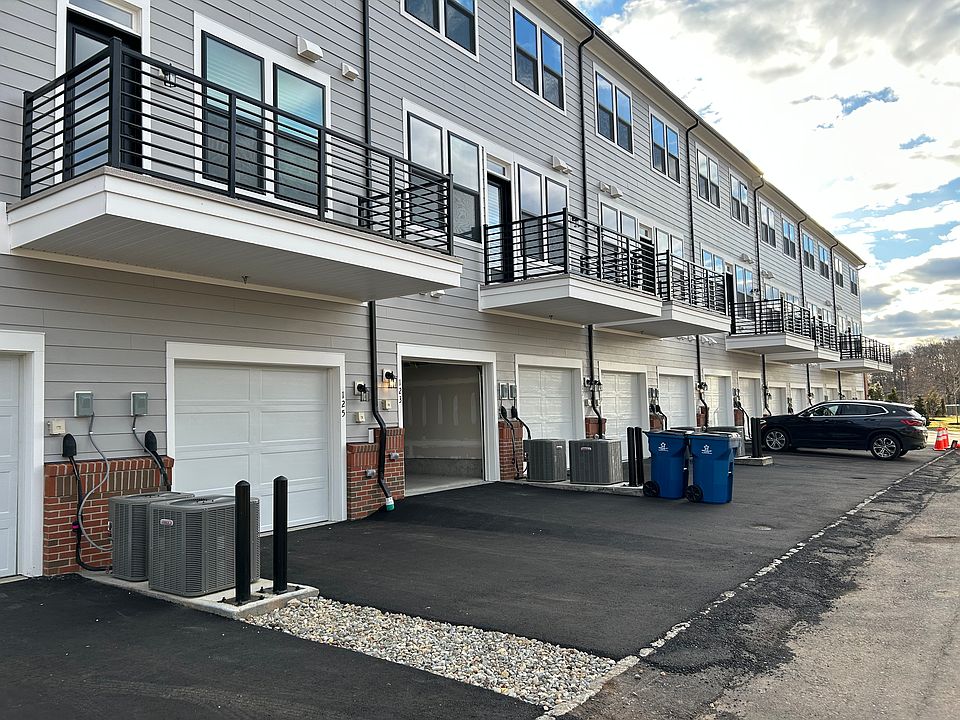 Back of the unit, the one with the opened garage door.
