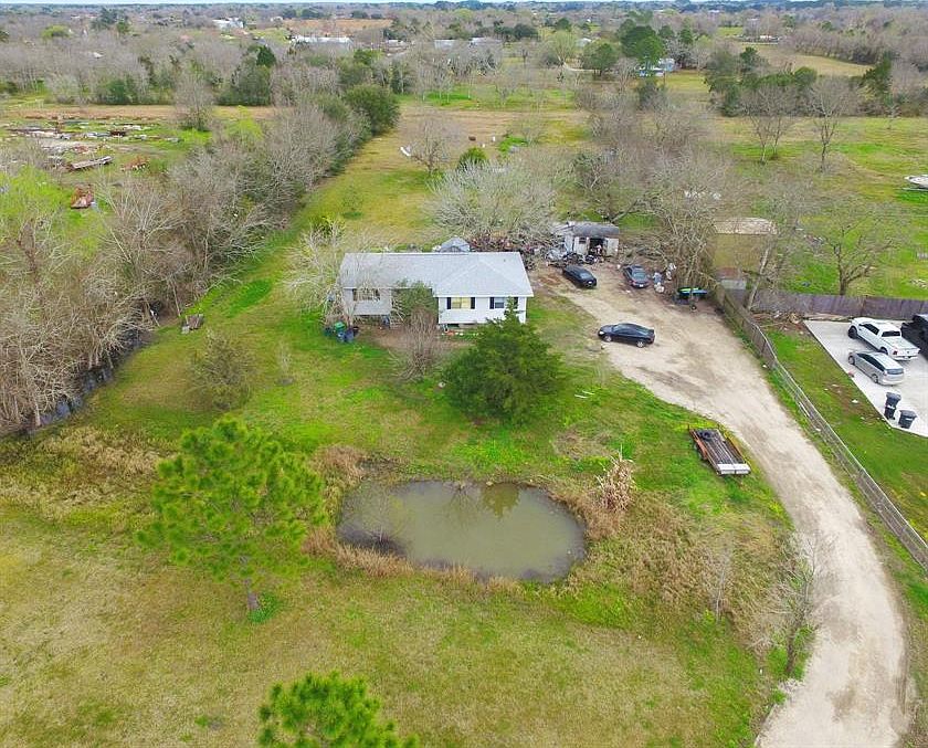 HOME WITH 2.26 ACRES AND POND