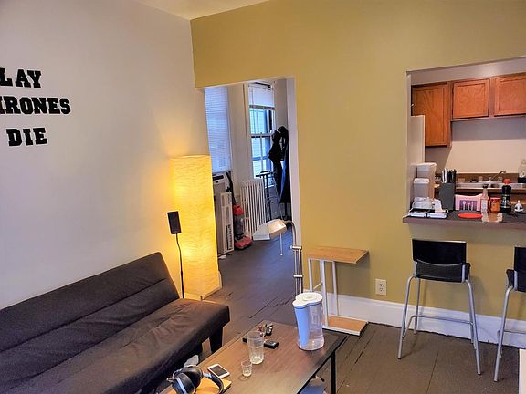 Living room looking towards kitchen and entry hall