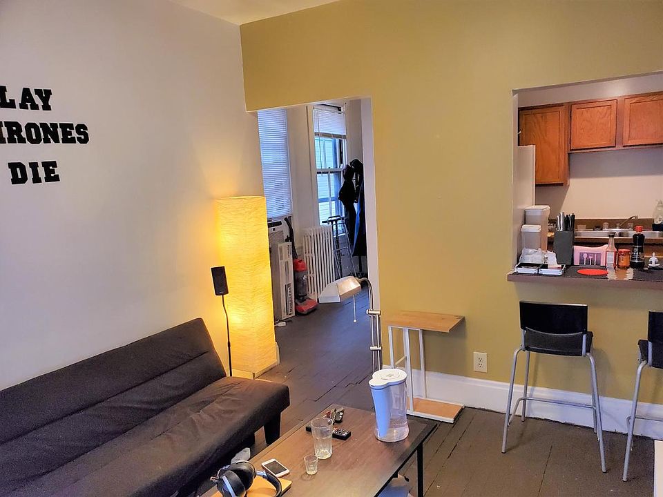 Living room looking towards kitchen and entry hall