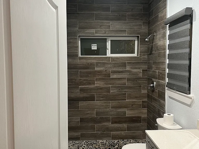 Photo taken from second bedroom full bathroom access door.