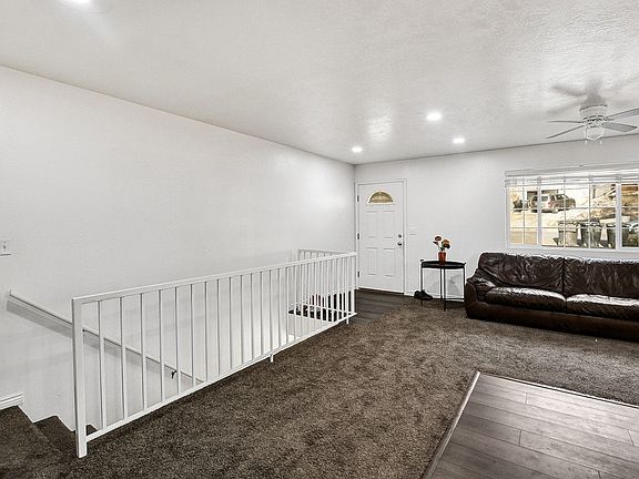 Entry, living room and stairs downstairs