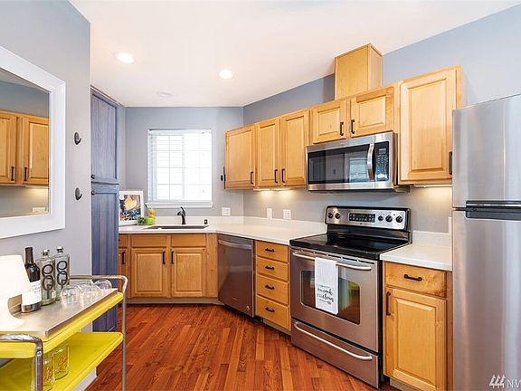 Look at the size of this kitchen, new counter tops and custom built pantry. All appliances remain