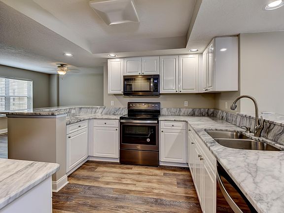 5th image of 4650 Links Village Dr Unit D701