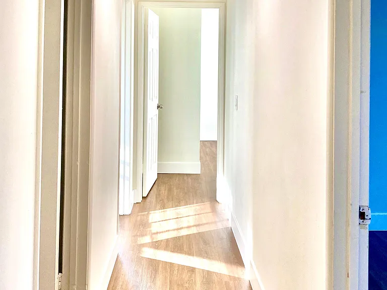 stairway to upstair hall way lead to master and two other bed rooms