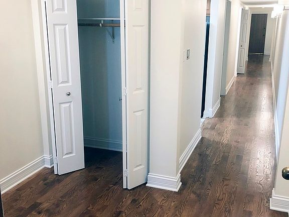 Entry closet - hardwood floors throughout