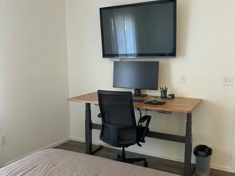 "Varidesk" and tv use included in rent.