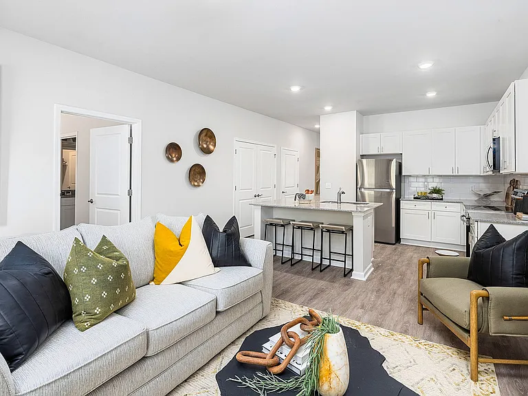 Modern open-concept living room and spacious kitchen