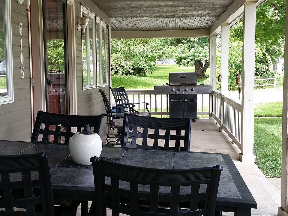 covered porch great for morning coffee, barbecues and entert