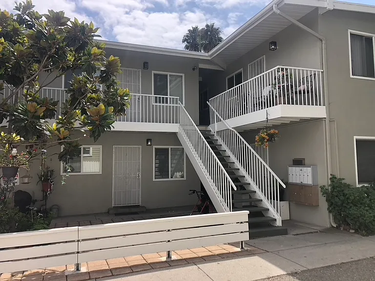 Front view of property with courtyard