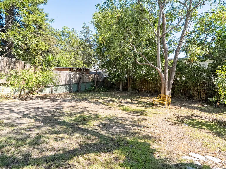 Expansive fenced in backyard