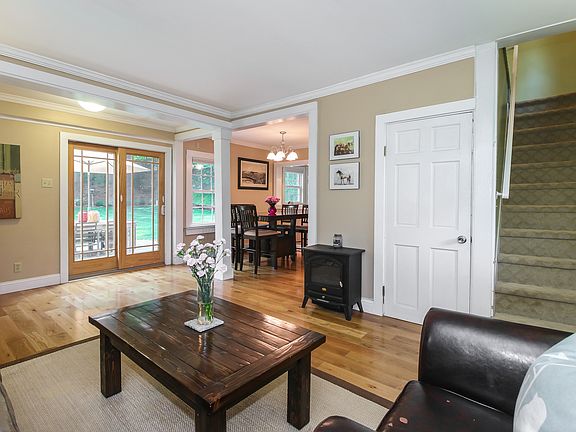 LR has hardwood floors and crown molding, and