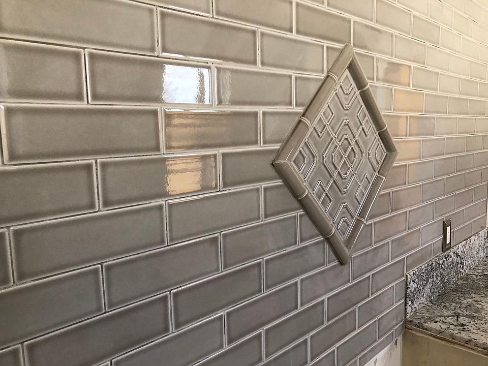 Custom kitchen back splashes w granite countertops. 