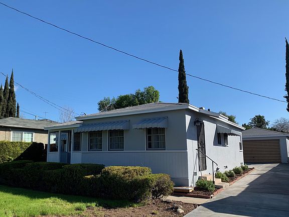 Side of house with new driveway.