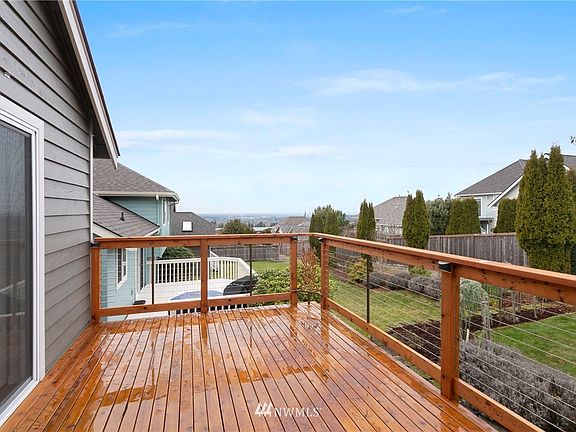 Enjoy western & Canadian views from updated back deck. 