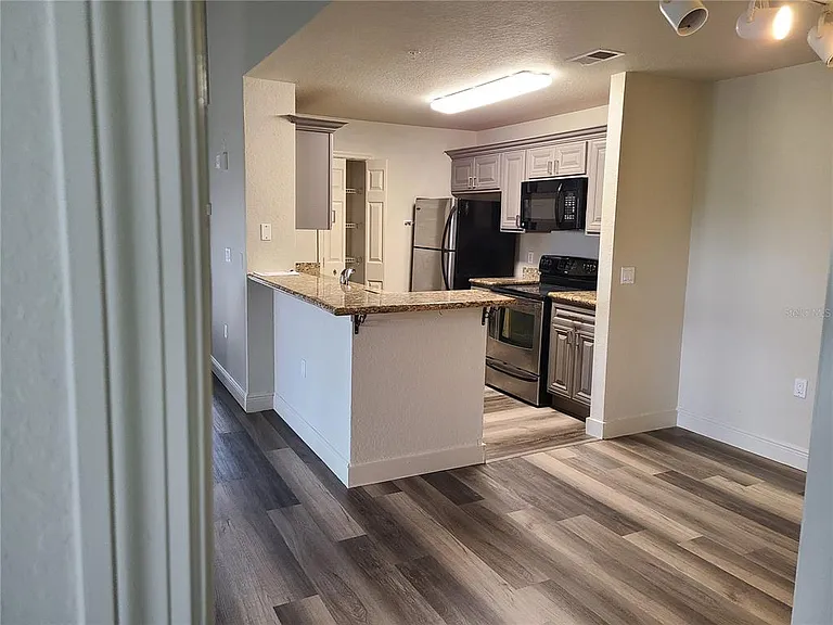 8911 Manor Loop #205 — Photo 4