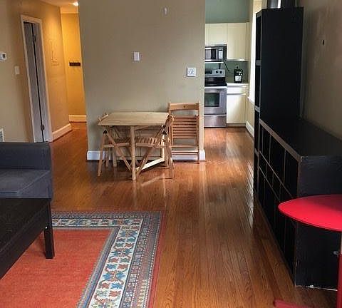 Looking into entry foyer and kitchen