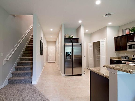 Open kitchen and living area - New townhome for sale in Sarasota, FL