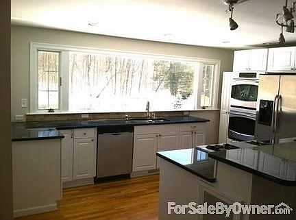 Kitchen, picture window facing backyard