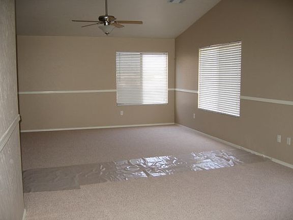 Huge family room/loft with new carpet and ceiling fans