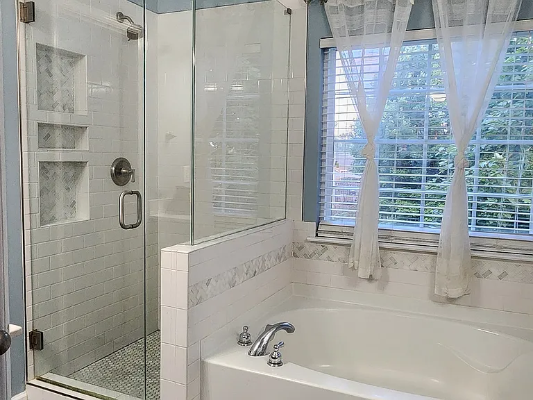 Master Bath with separate shower and Bath tub & dual vanities