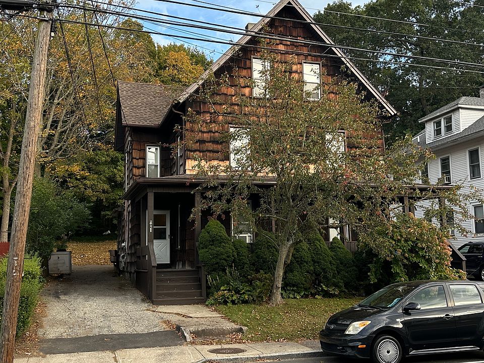 Exterior of the home with a view of the front door on the left