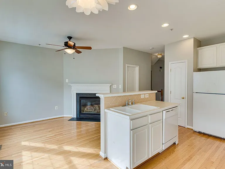 Kitchen great room with cozy fireplace.