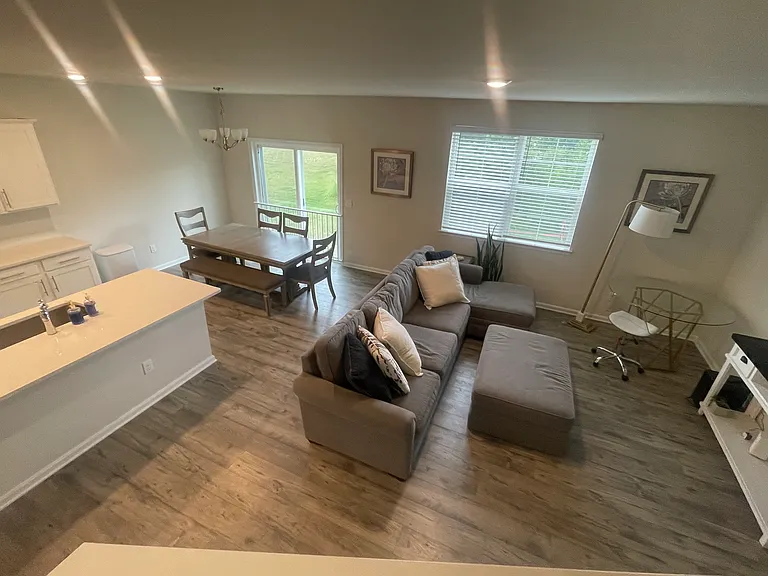 From stairs looking down on living space