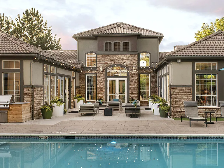 Apartment community resort-style pool + all-season spa at Griffis Belleview Station in Denver, Colorado.