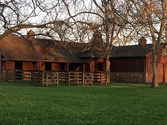 THIS BARN WAS BUILT BY NELSON BASS AND COULD BE USED FOR HORSES, CARS, OR EVEN CONVERTED INTO LIVING QUARTERS! IT IS THE NICEST BARN I HAVE EVER SEEN!!!!