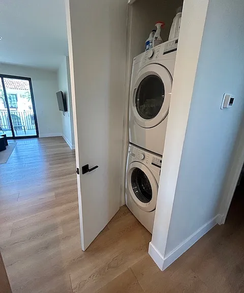 Inside Laundry with full size washer and dryer