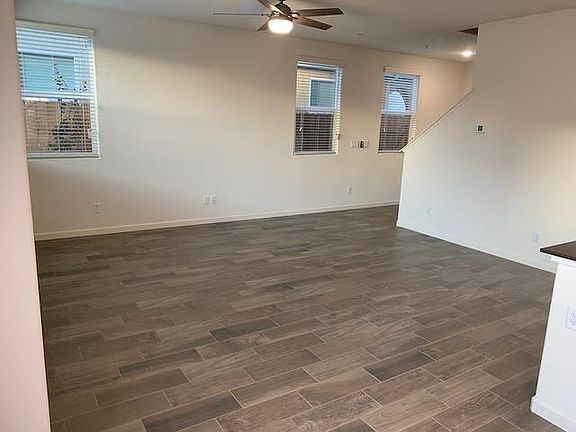 Living Room with ceiling Fan