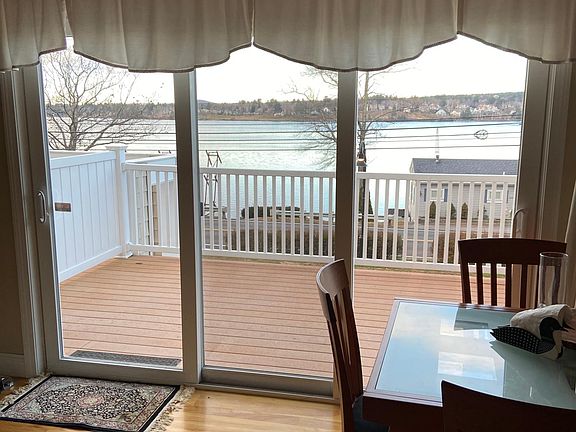 Living Room Sliding Doors with view of Paugus Bay.