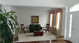 The living room offers warm, neutral colors.