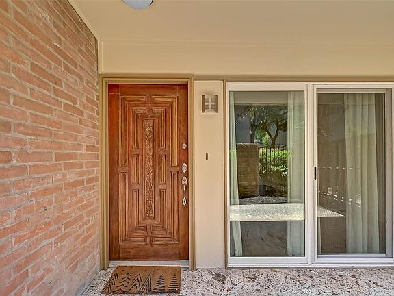 This charming two story corner unit features 2 over-sized primary bedrooms upstairs each with an ensuite bathroom, and a large living area, kitchen, and half-bath downstairs.