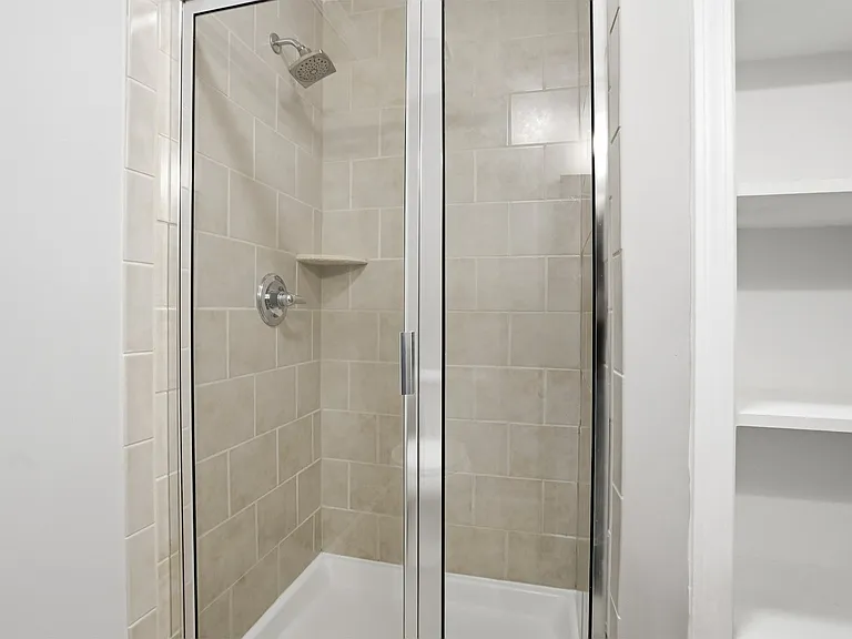 Secondary Bath with Walk-in Shower and Storage