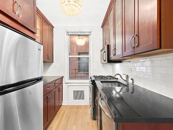5th image of 30 E 9th St APT 2A