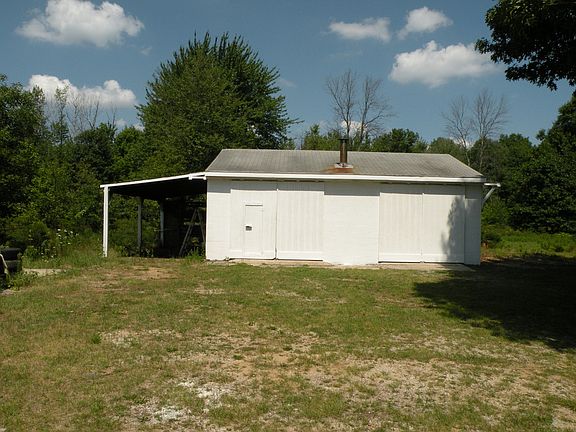 Cement garage, with 220 electrical.