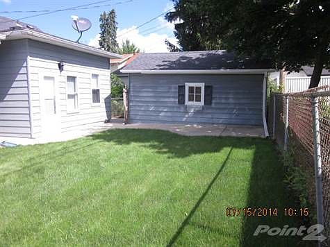 Back Yard View Patio and Garage