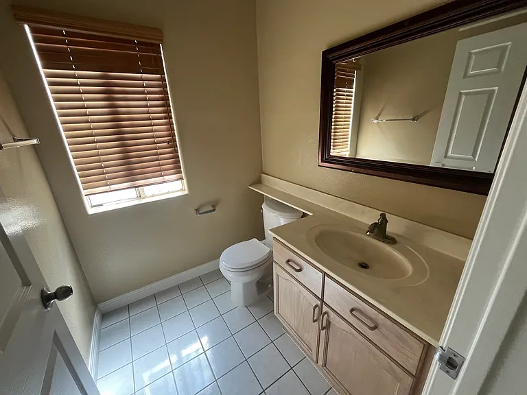 Main floor powder room with brand new toilet